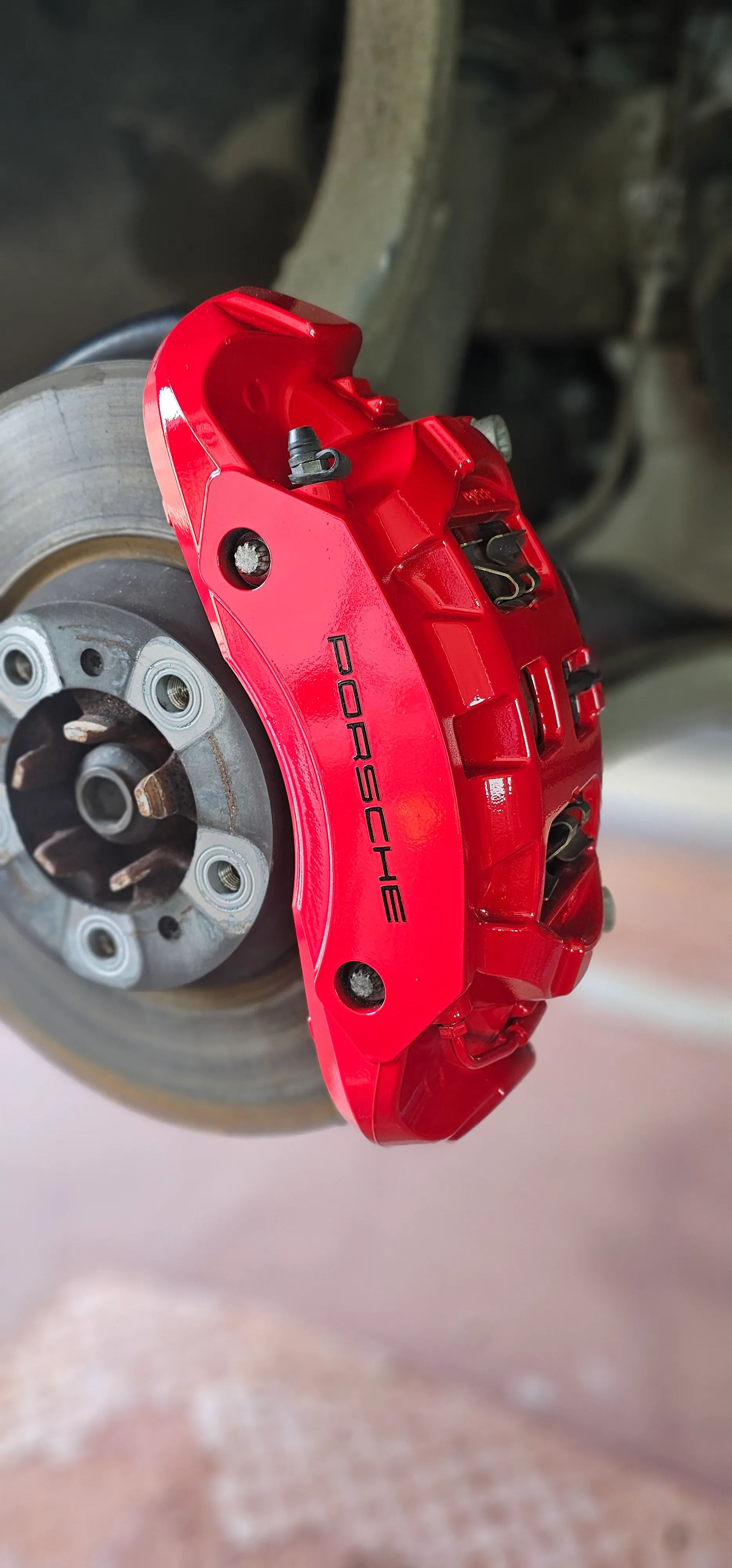A close up of a brake on a vehicle.