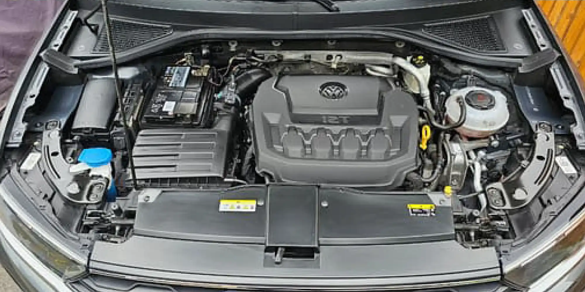 a car engine with its bonnetopen